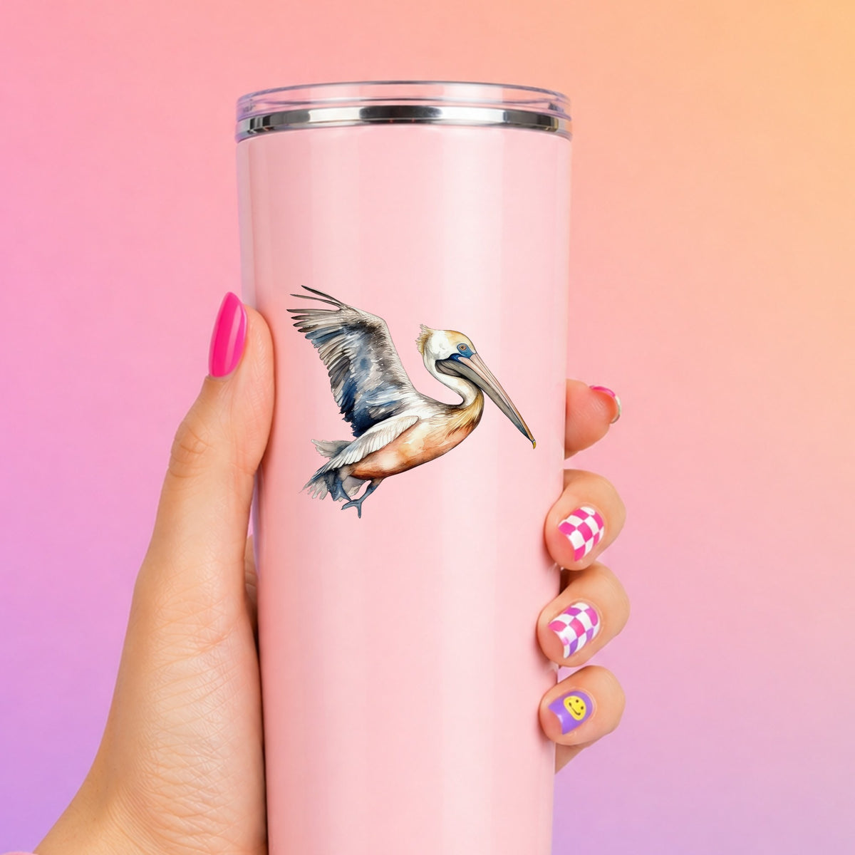 Blue Winged Pelican UV DTF sticker applied to a pink tumbler
