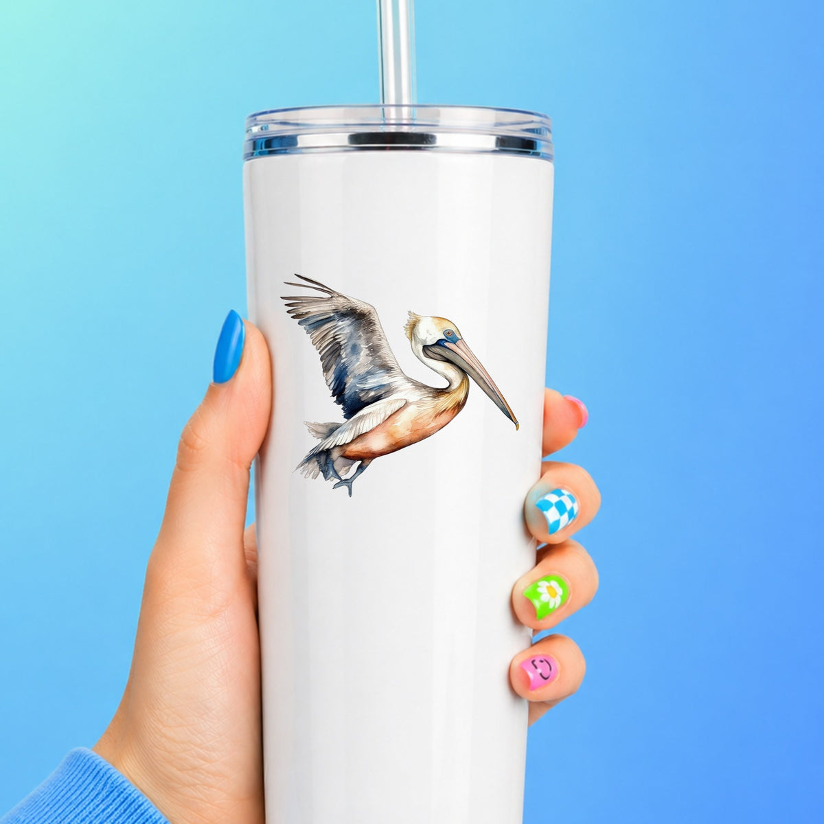 Blue Winged Pelican UV DTF sticker applied to a white tumbler