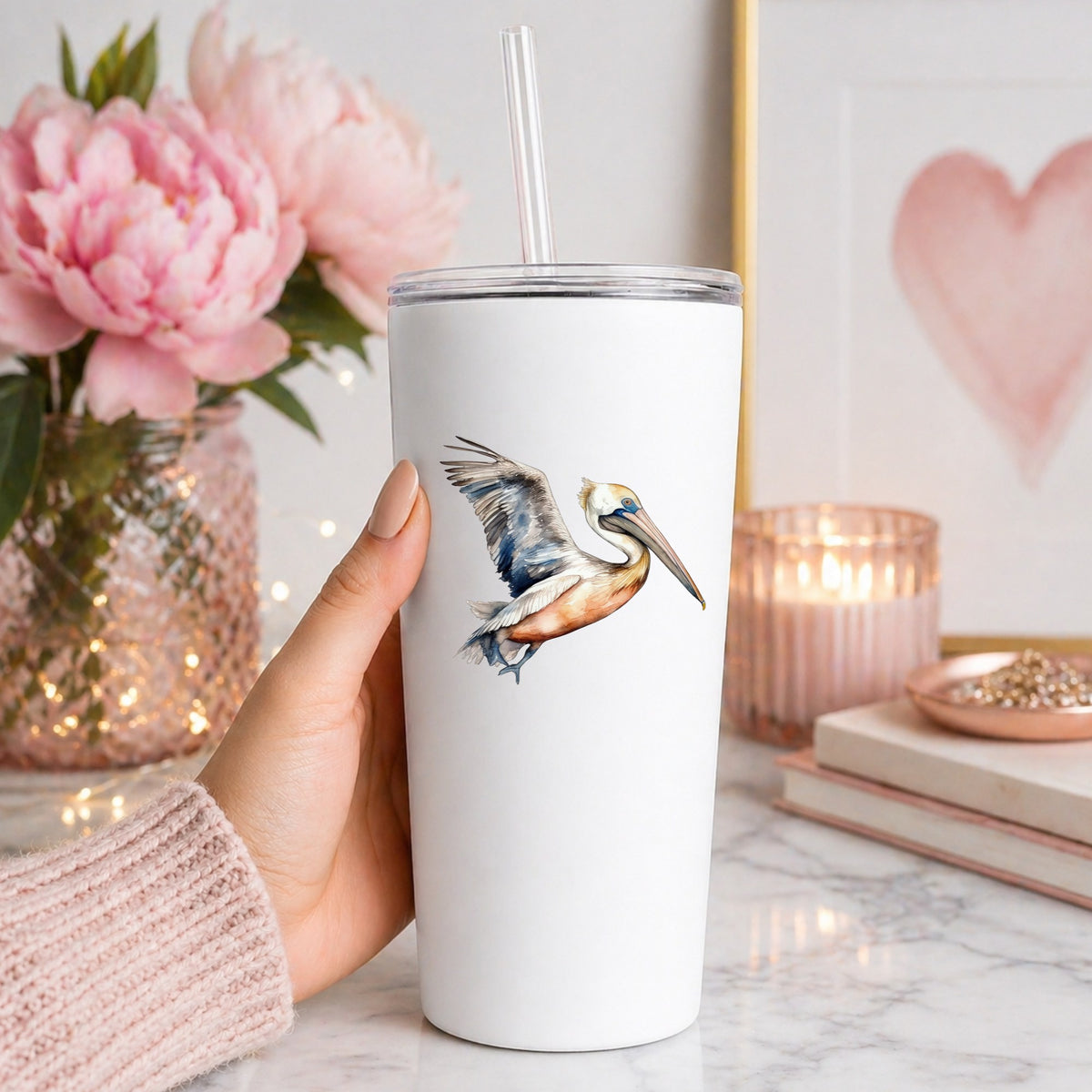 Blue Winged Pelican UV DTF sticker applied to a white tumbler