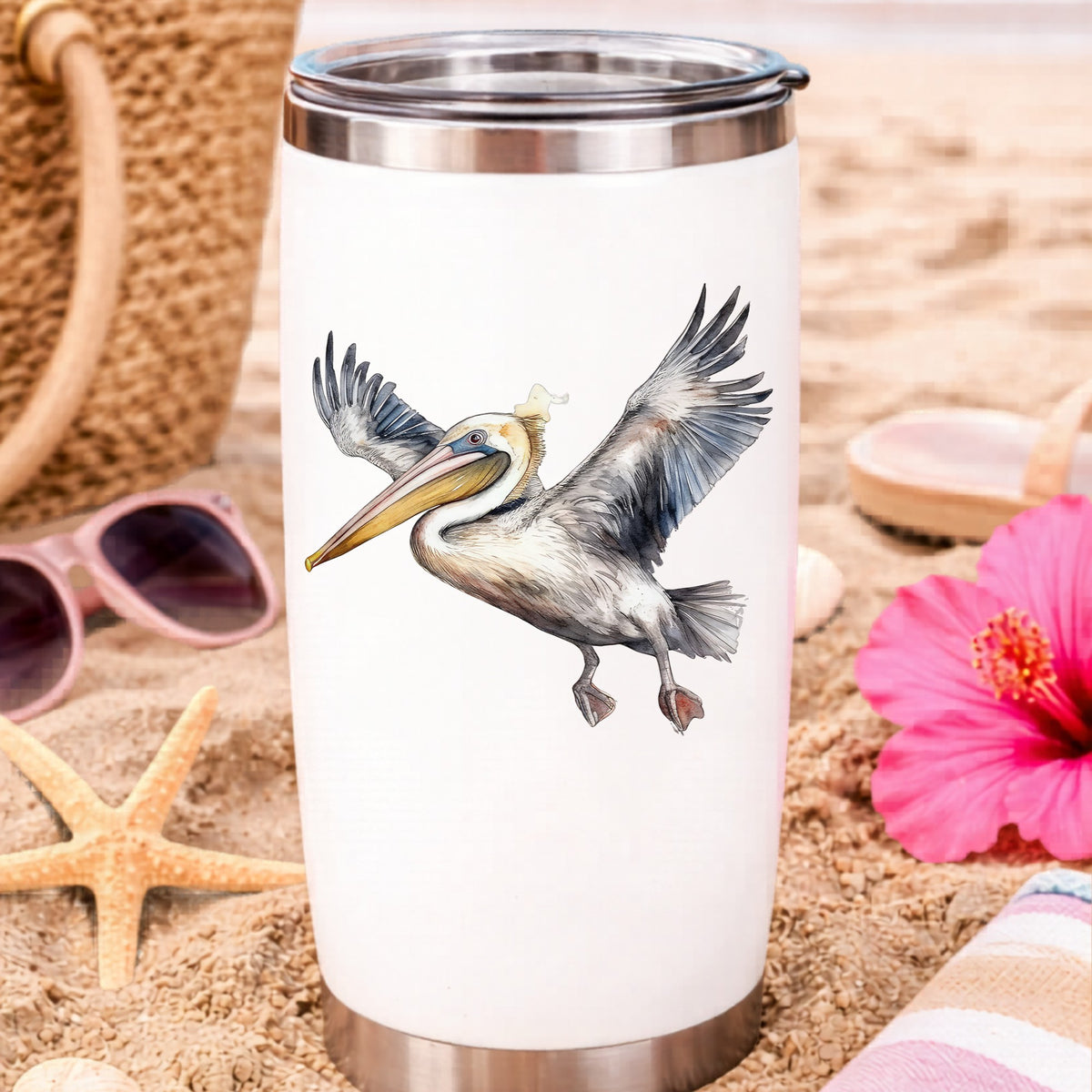 Pelican Taking Flight UV DTF sticker applied to a water bottle at the beach