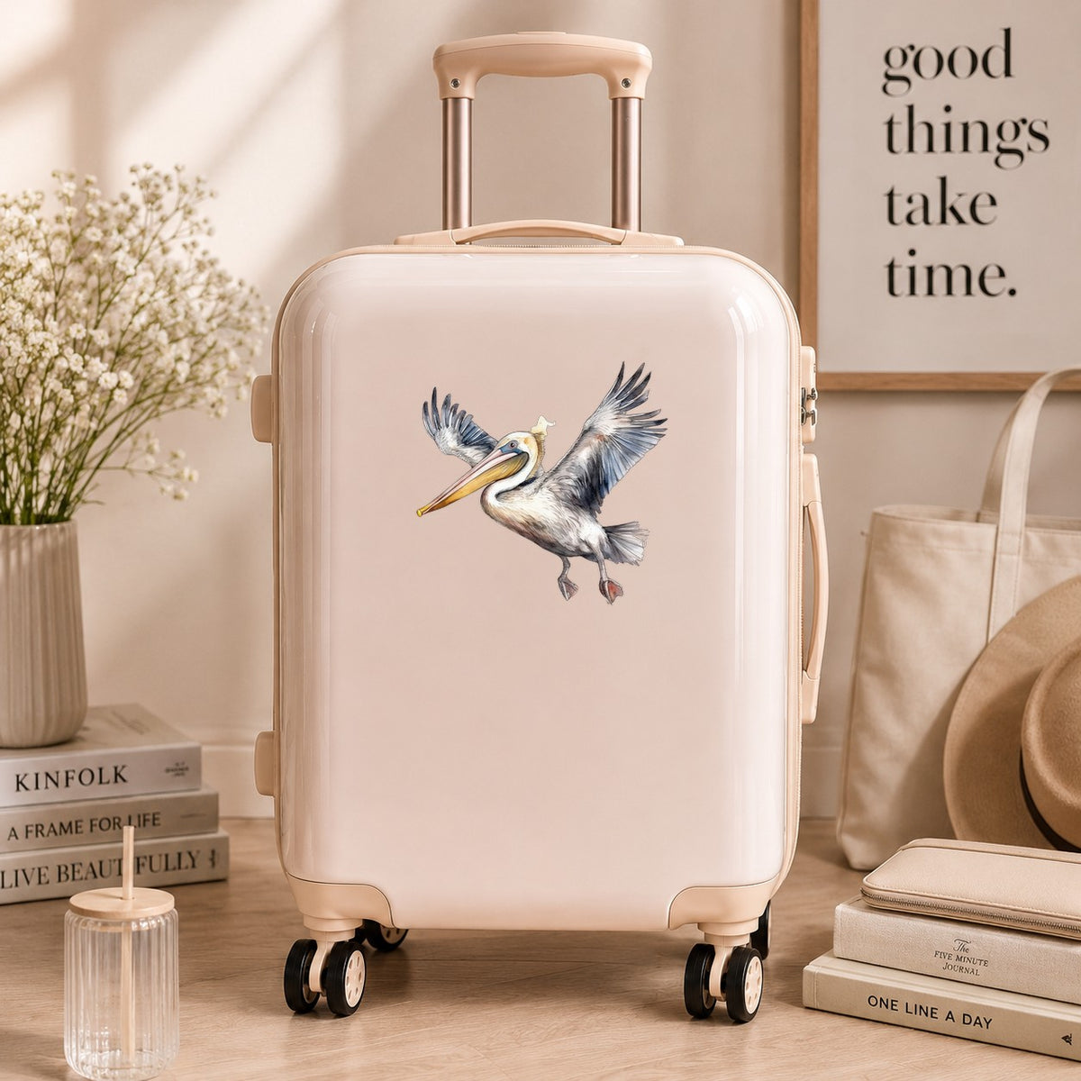 Pelican Taking Flight UV DTF sticker applied to a neutral suitcase