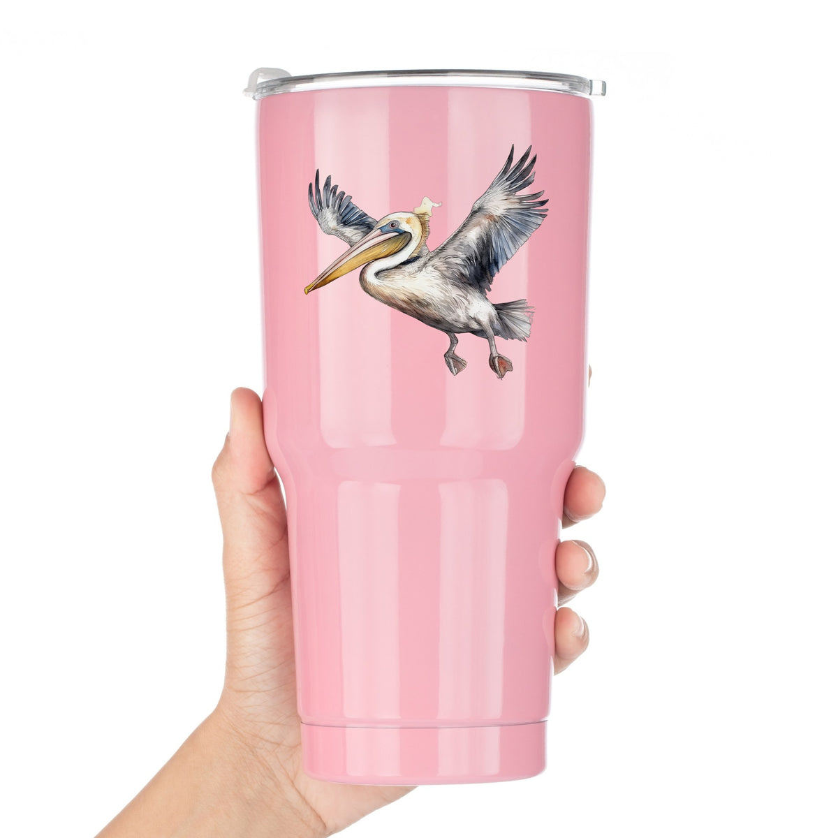 Pelican Taking Flight UV DTF sticker applied to a pink tumbler