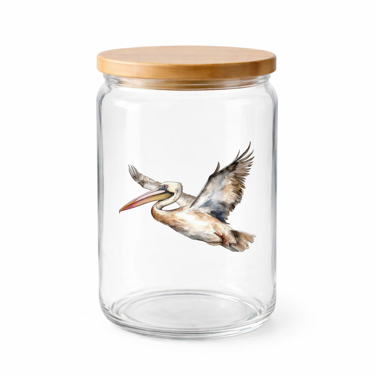 Coastal Pelican In Flight UV DTF sticker applied to a clear glass jar with lid
