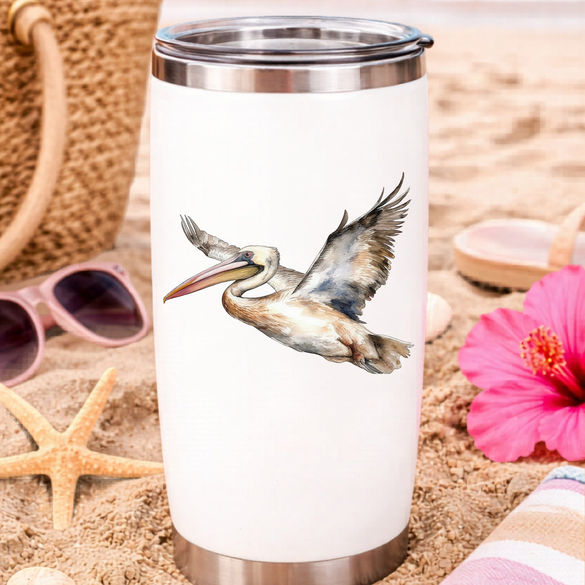 Coastal Pelican In Flight UV DTF sticker applied to a water bottle at the beach