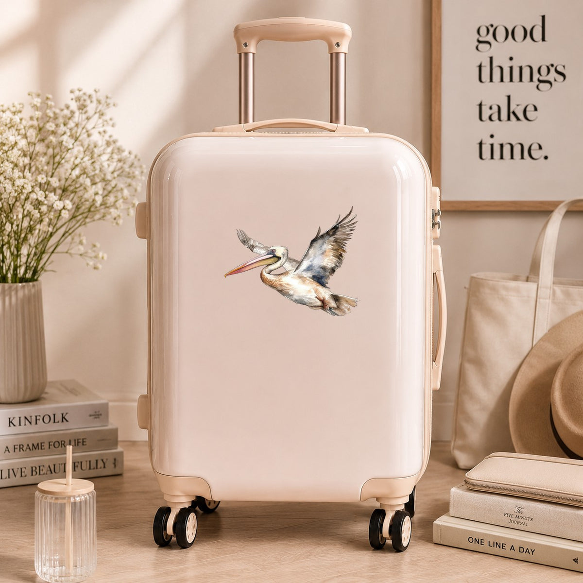 Coastal Pelican In Flight UV DTF sticker applied to a neutral suitcase