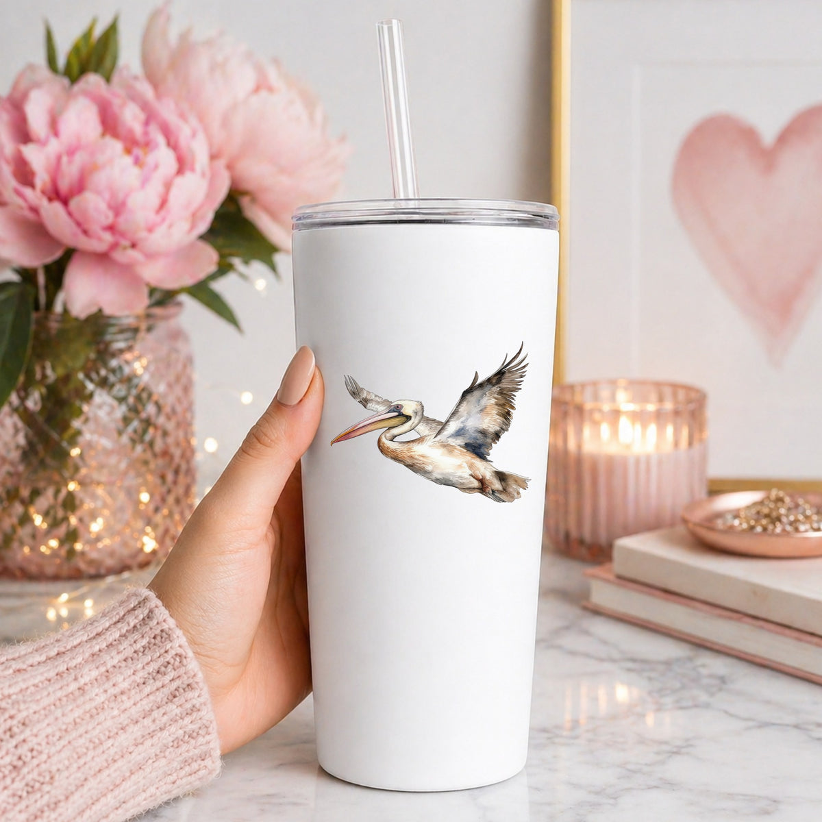 Coastal Pelican In Flight UV DTF sticker applied to a white tumbler