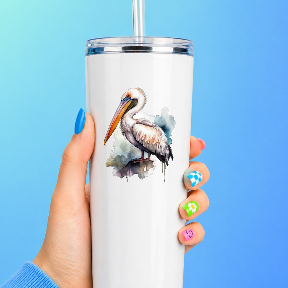 Teal Splash Pelican UV DTF sticker applied to a white tumbler