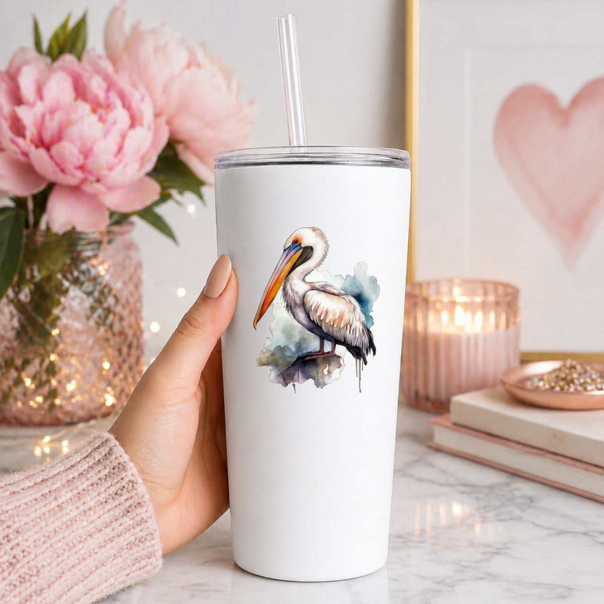 Teal Splash Pelican UV DTF sticker applied to a white tumbler