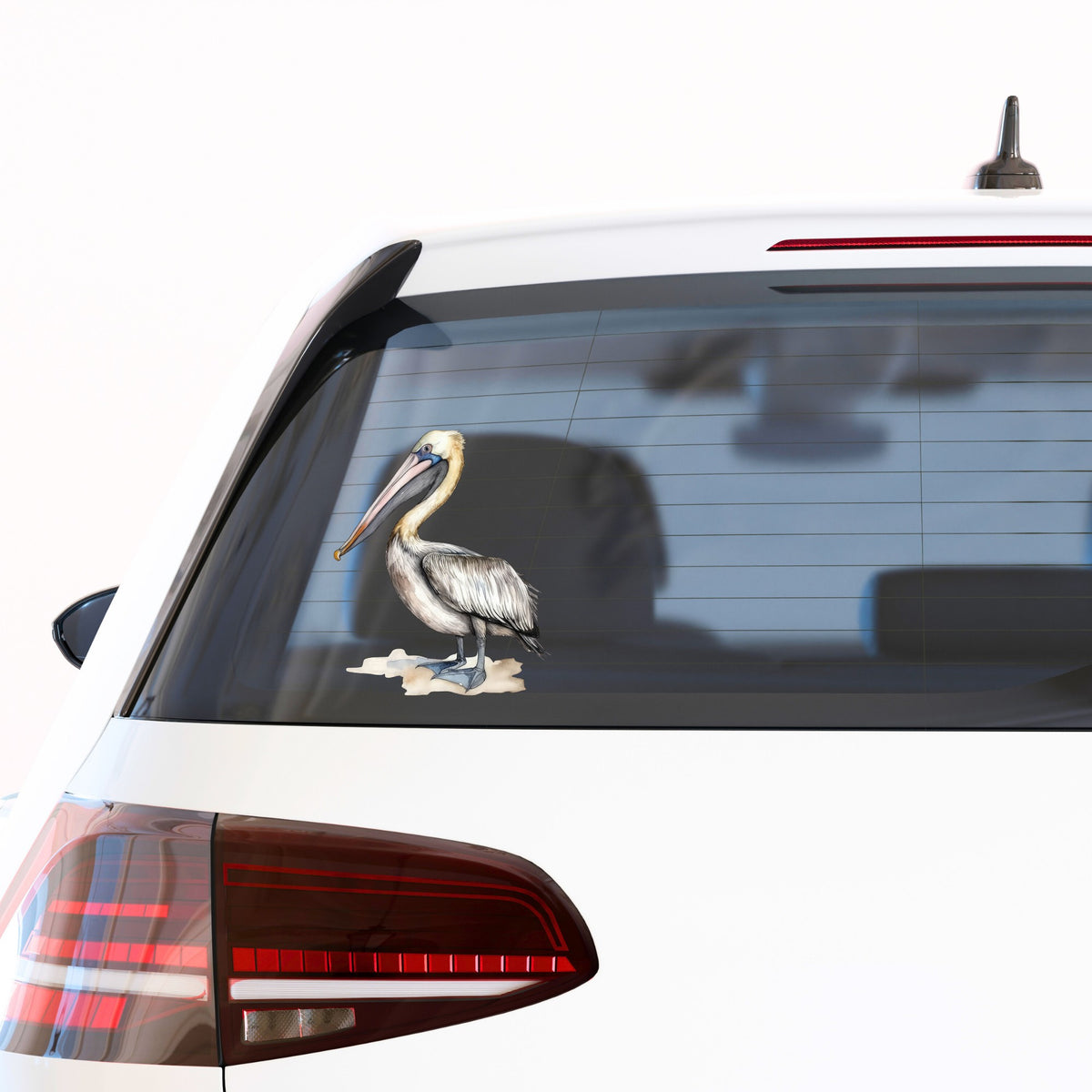 Pelican On Sand UV DTF sticker applied to a car window