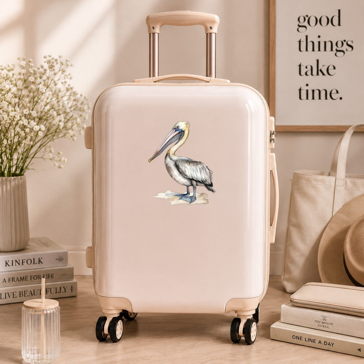 Pelican On Sand UV DTF sticker applied to a neutral suitcase