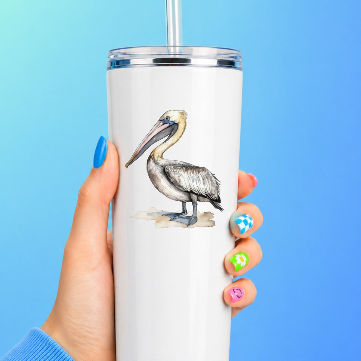 Pelican On Sand UV DTF sticker applied to a white tumbler