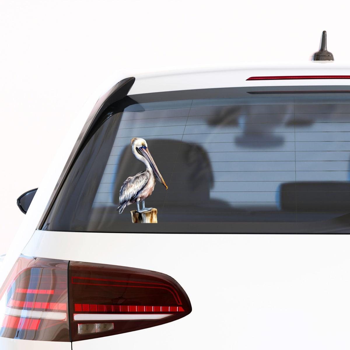 Pelican On Wood Post UV DTF sticker applied to a car window