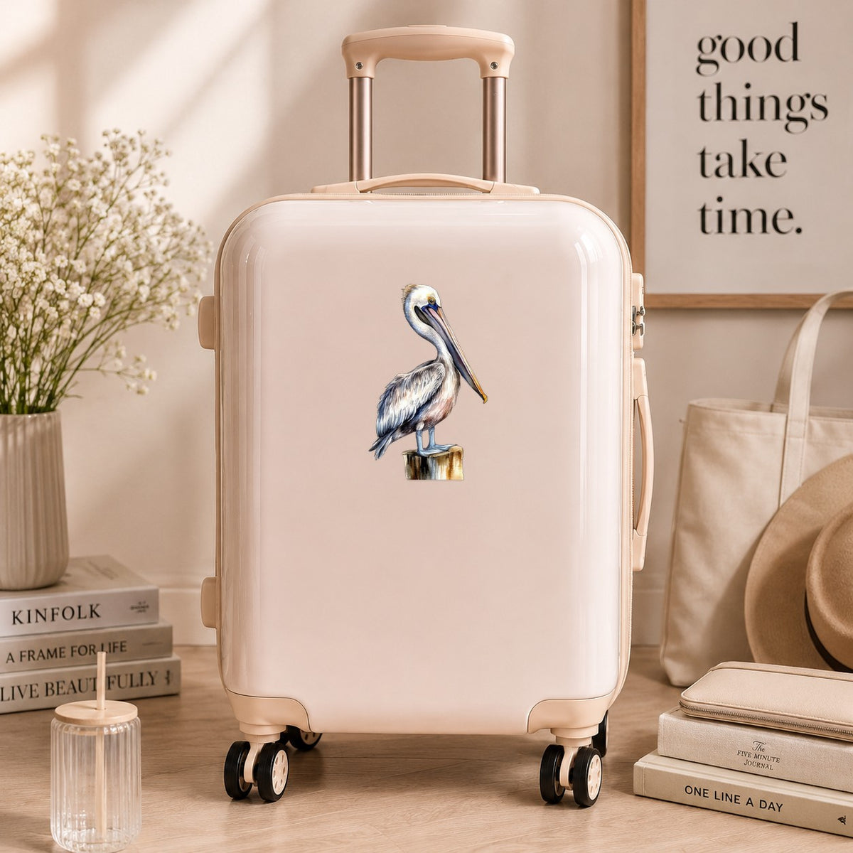 Pelican On Wood Post UV DTF sticker applied to a neutral suitcase