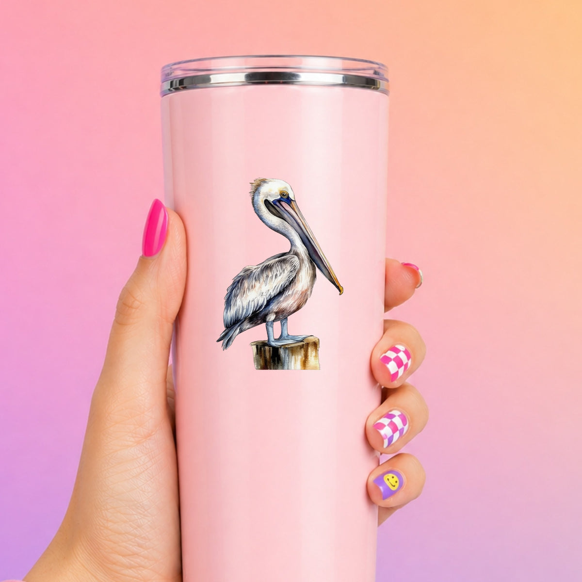 Pelican On Wood Post UV DTF sticker applied to a pink tumbler
