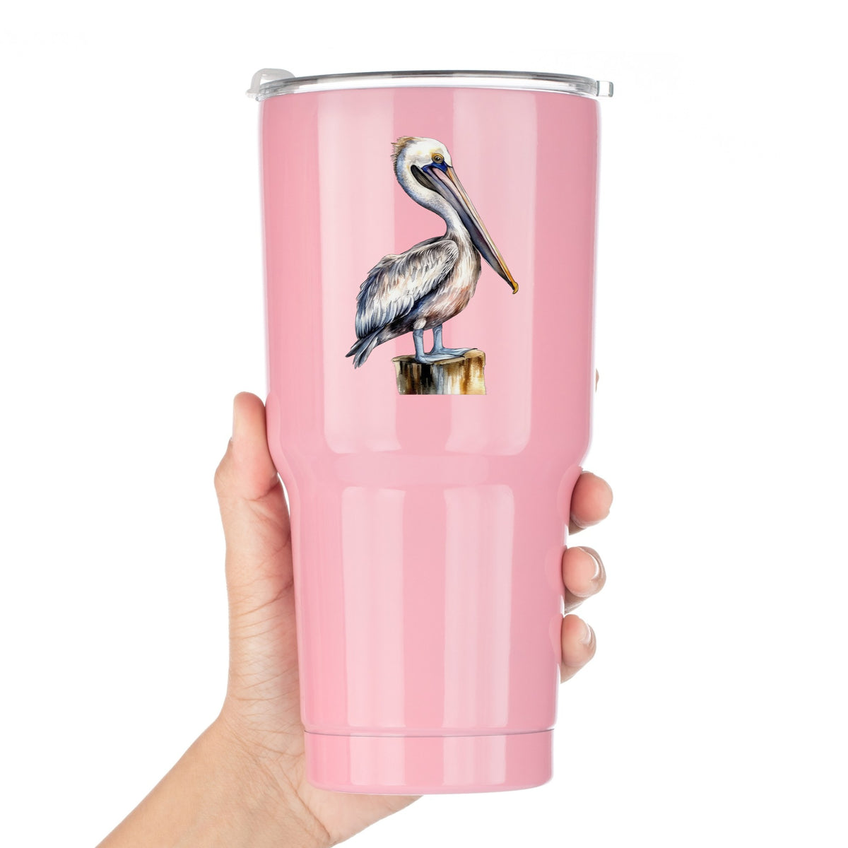 Pelican On Wood Post UV DTF sticker applied to a pink tumbler