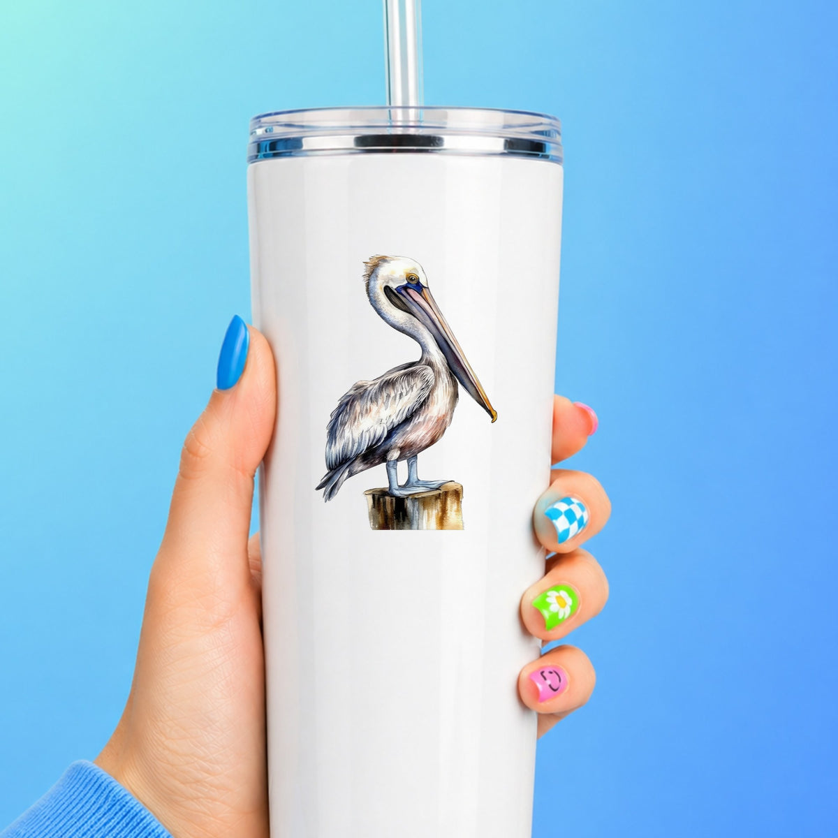 Pelican On Wood Post UV DTF sticker applied to a white tumbler