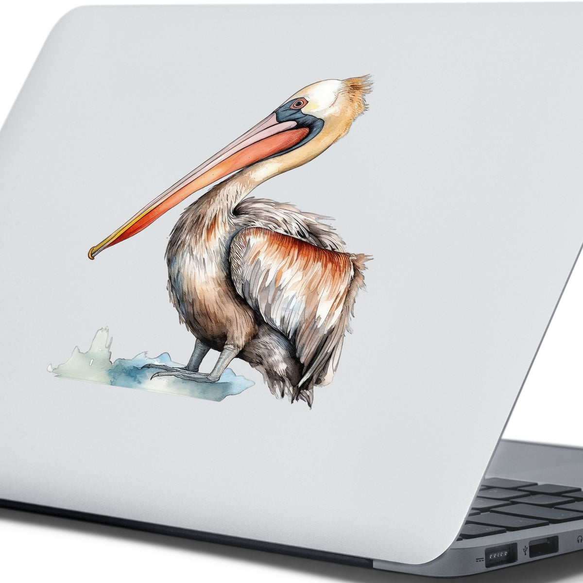 Rust Orange Pelican UV DTF sticker applied to a laptop
