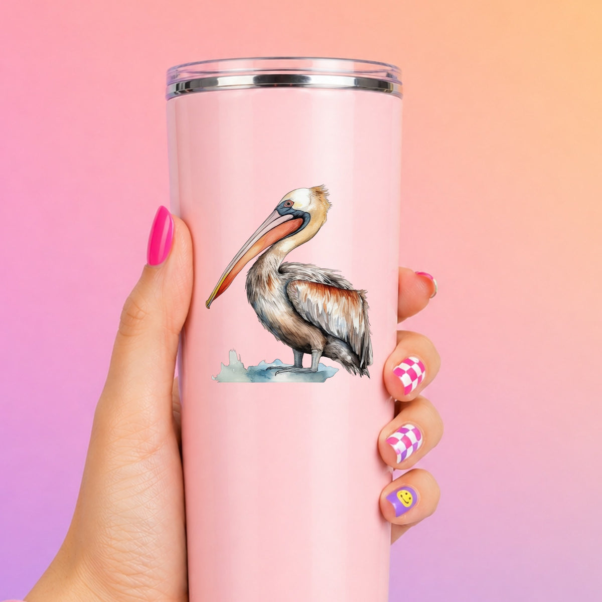 Rust Orange Pelican UV DTF sticker applied to a pink tumbler
