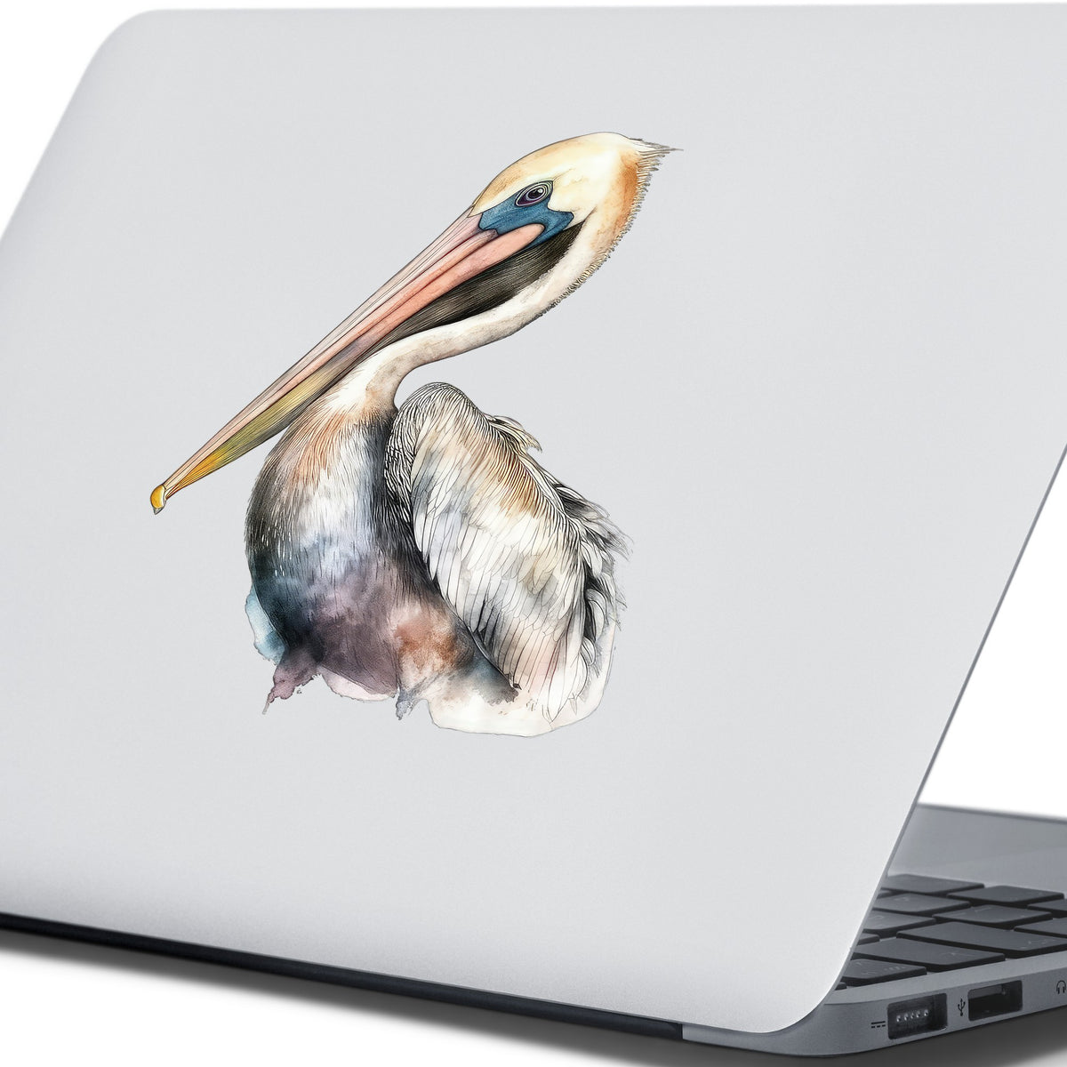 Standing Pelican UV DTF sticker applied to a laptop