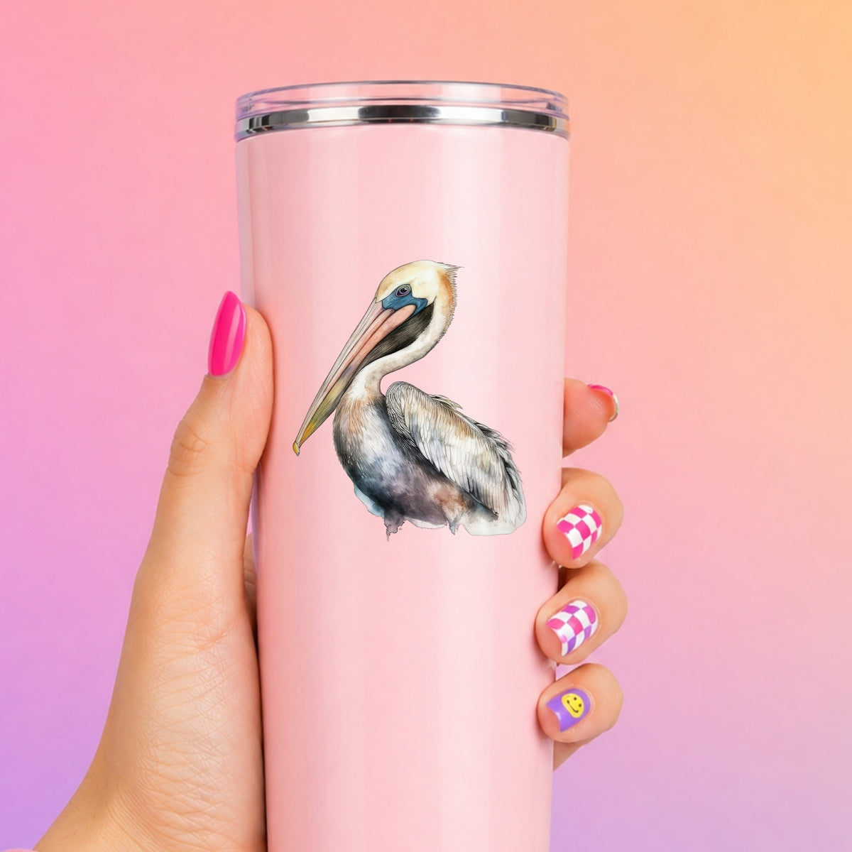 Standing Pelican UV DTF sticker applied to a pink tumbler