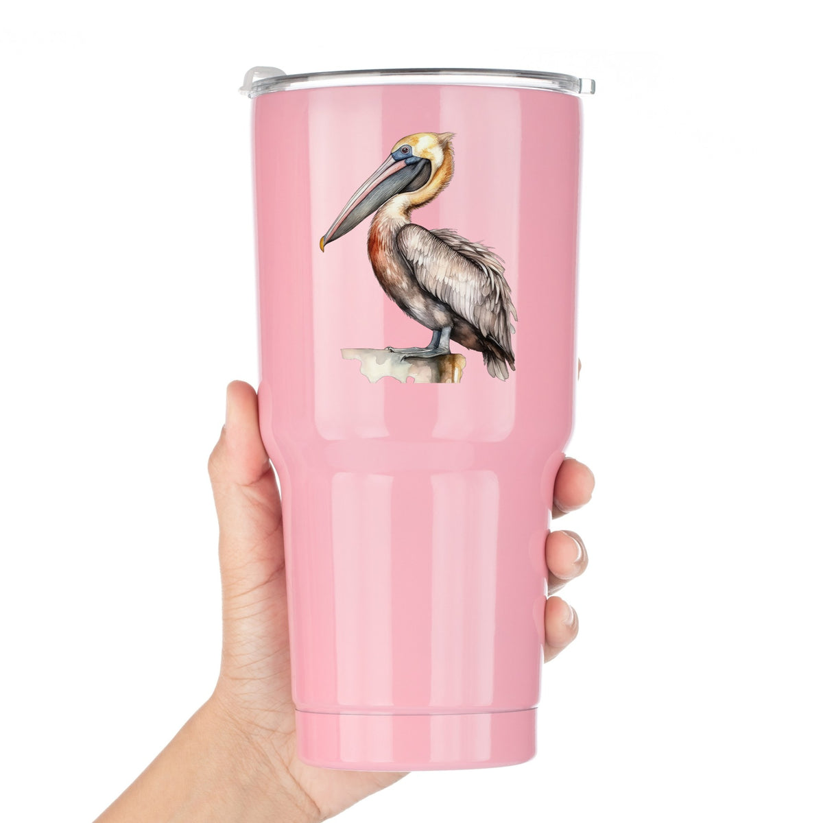 Golden Head Pelican UV DTF sticker applied to a pink tumbler