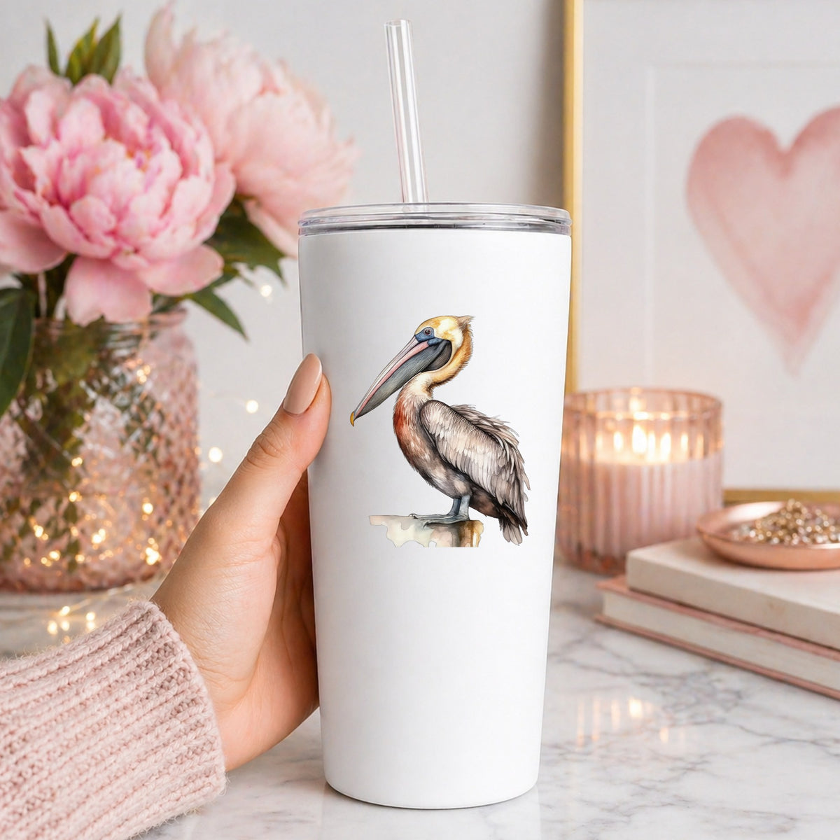 Golden Head Pelican UV DTF sticker applied to a white tumbler