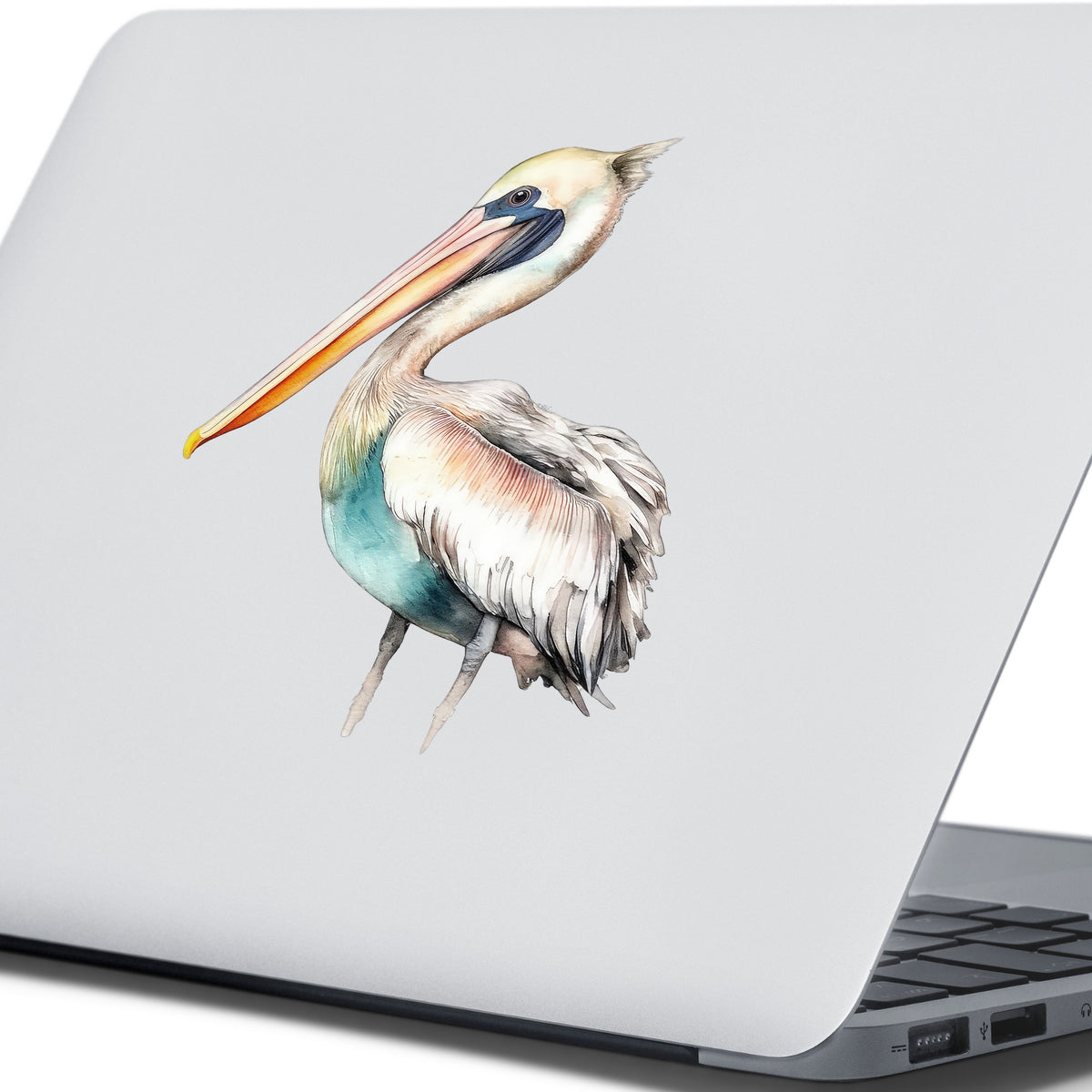 Turquoise Pelican UV DTF sticker applied to a laptop