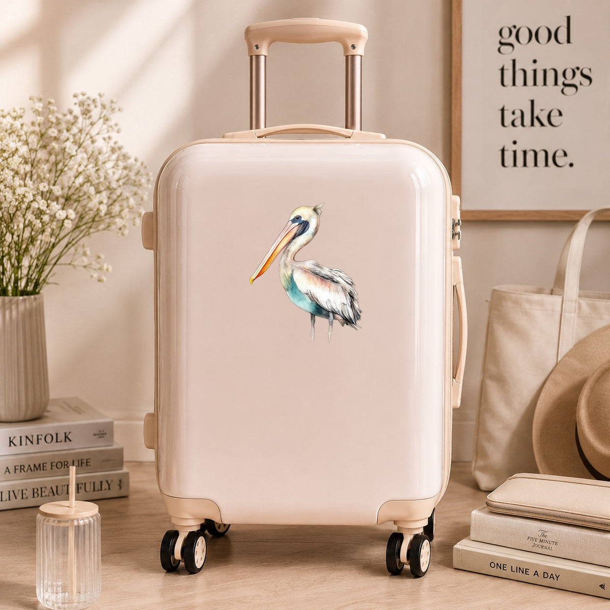 Turquoise Pelican UV DTF sticker applied to a neutral suitcase