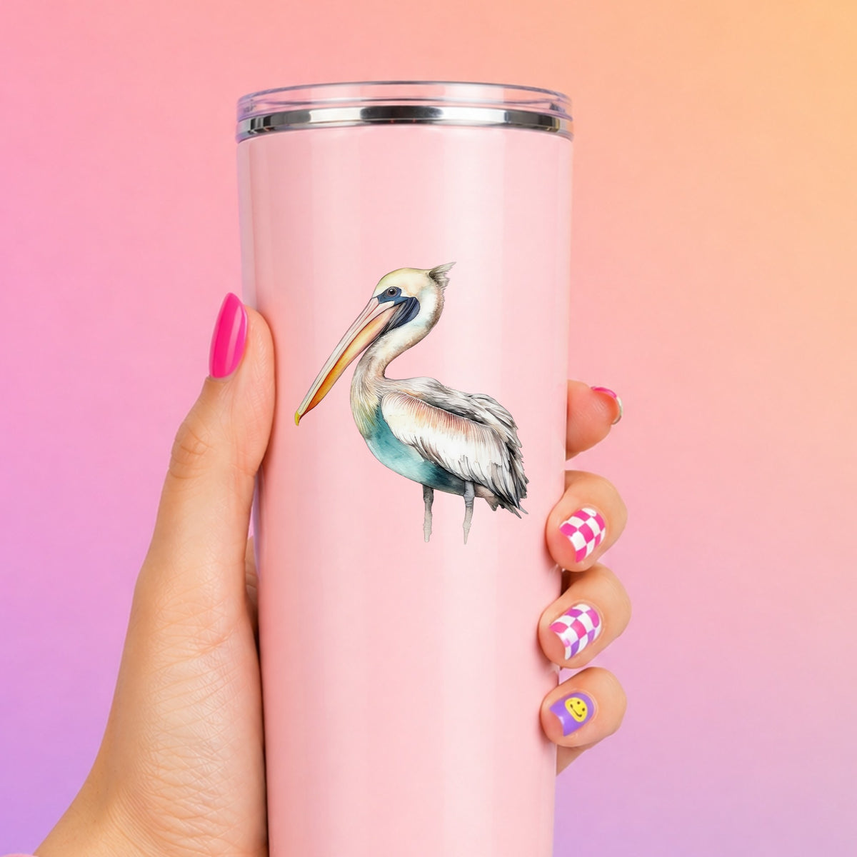 Turquoise Pelican UV DTF sticker applied to a pink tumbler