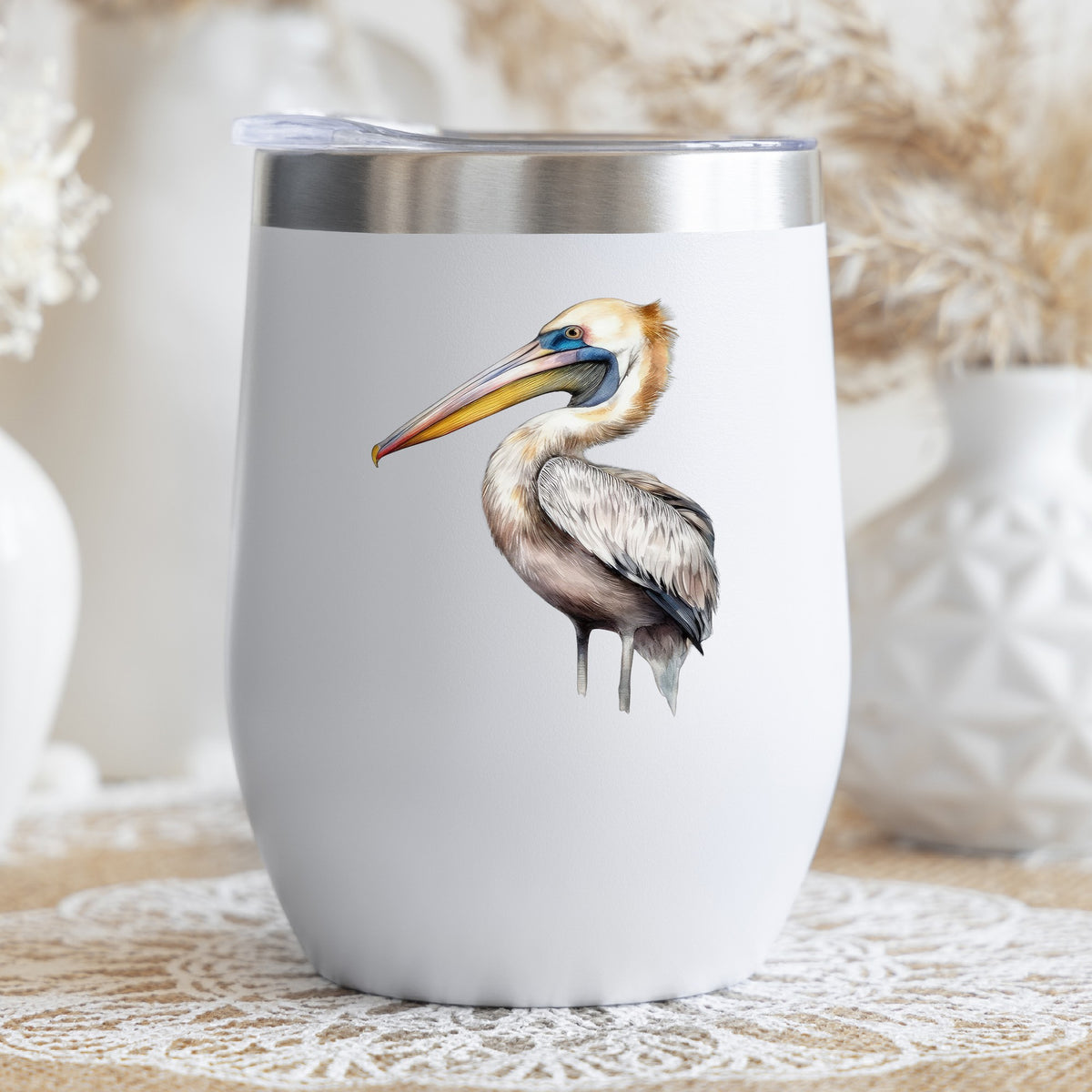 Striding Pelican UV DTF sticker applied to a stemless wine glass