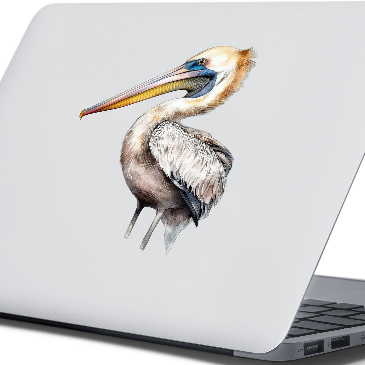 Striding Pelican UV DTF sticker applied to a laptop