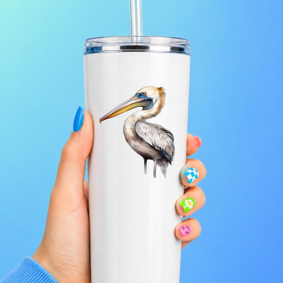 Striding Pelican UV DTF sticker applied to a white tumbler