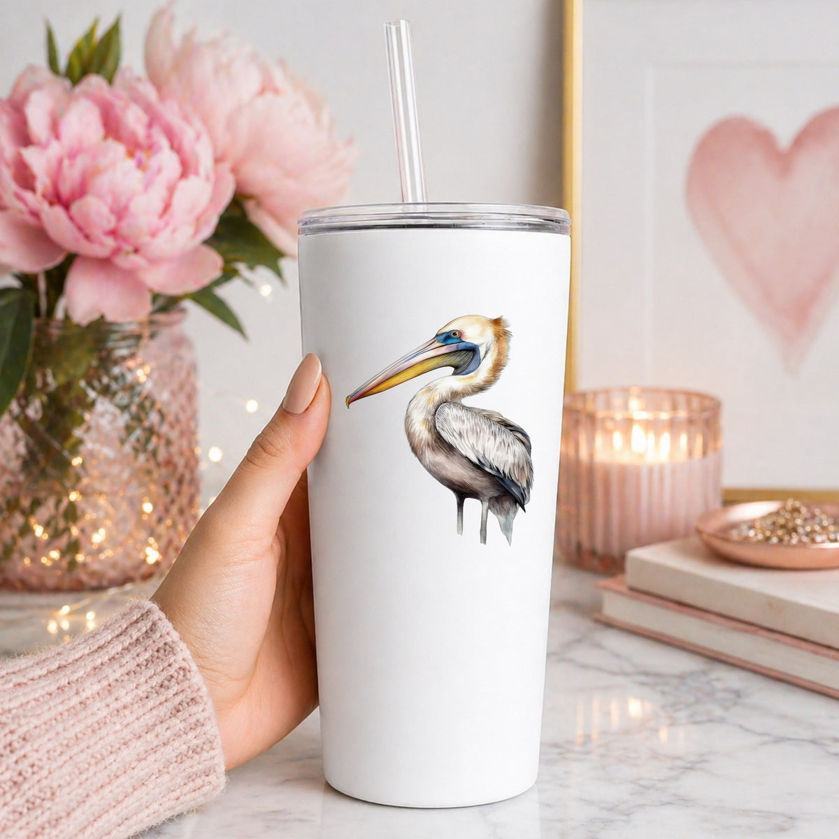 Striding Pelican UV DTF sticker applied to a white tumbler