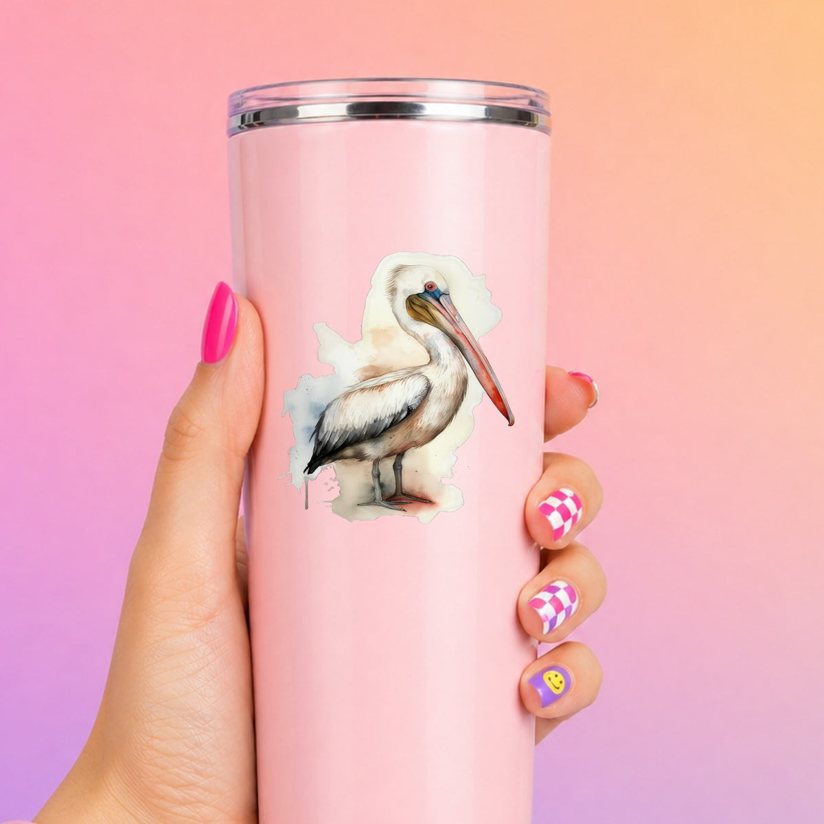Long Beaked Pelican UV DTF sticker applied to a pink tumbler