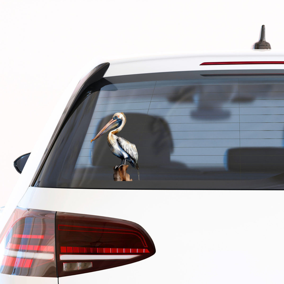 Pelican Perched On Piling UV DTF sticker applied to a car window