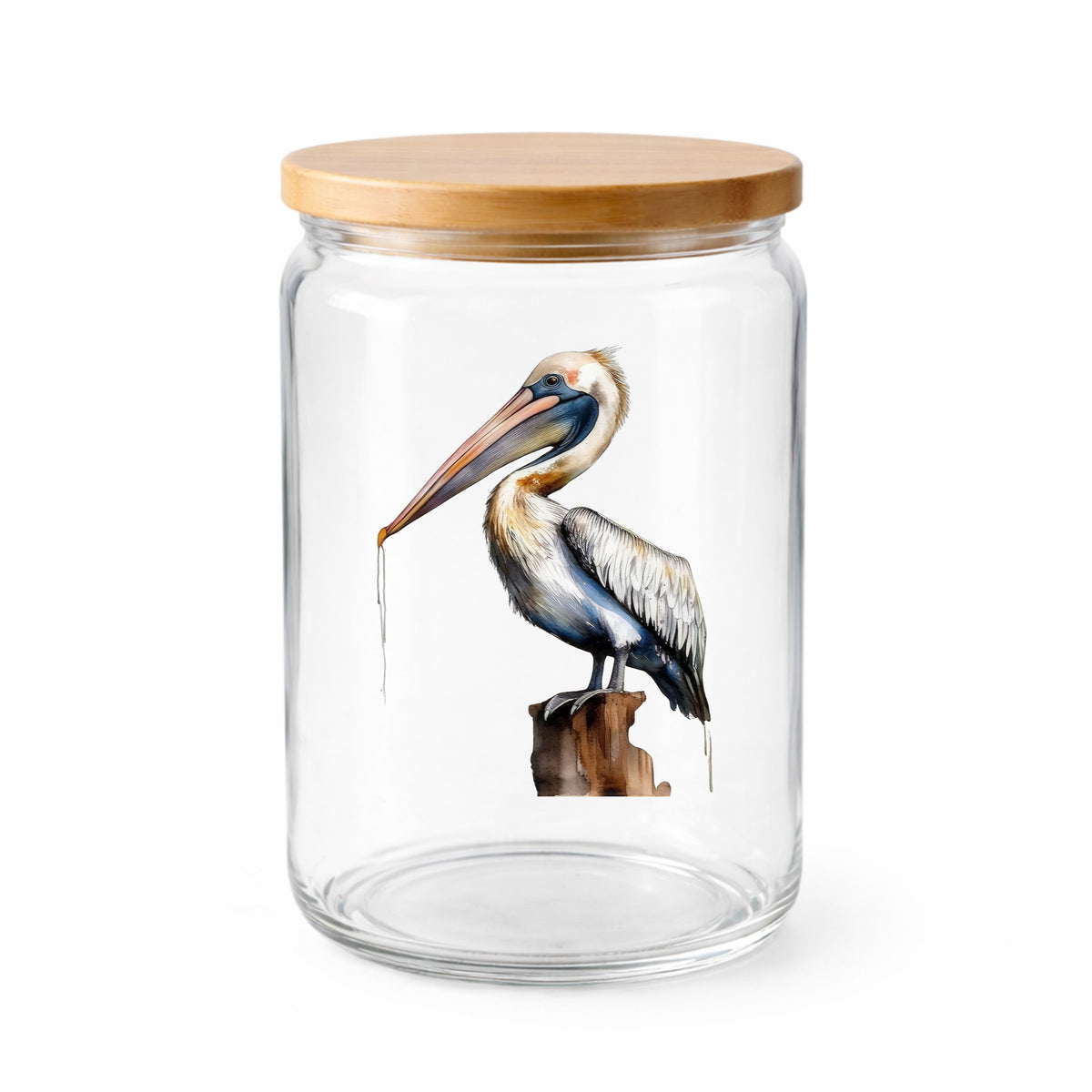Pelican Perched On Piling UV DTF sticker applied to a clear glass jar with lid