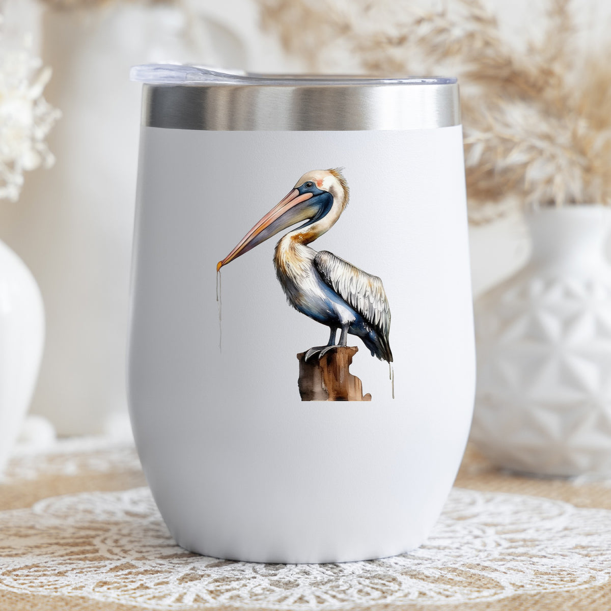 Pelican Perched On Piling UV DTF sticker applied to a stemless wine glass