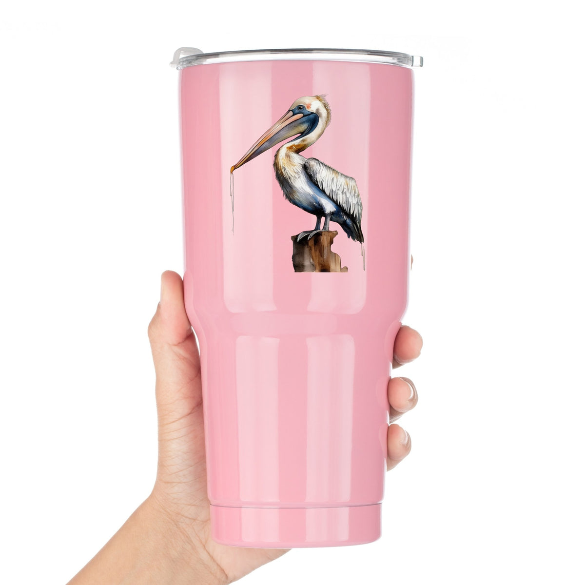 Pelican Perched On Piling UV DTF sticker applied to a pink tumbler