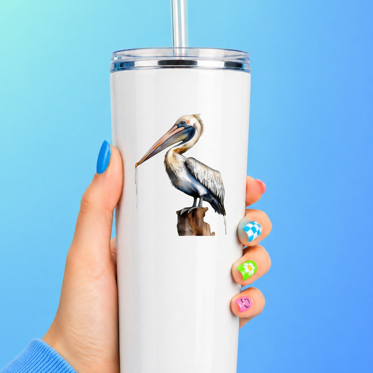 Pelican Perched On Piling UV DTF sticker applied to a white tumbler