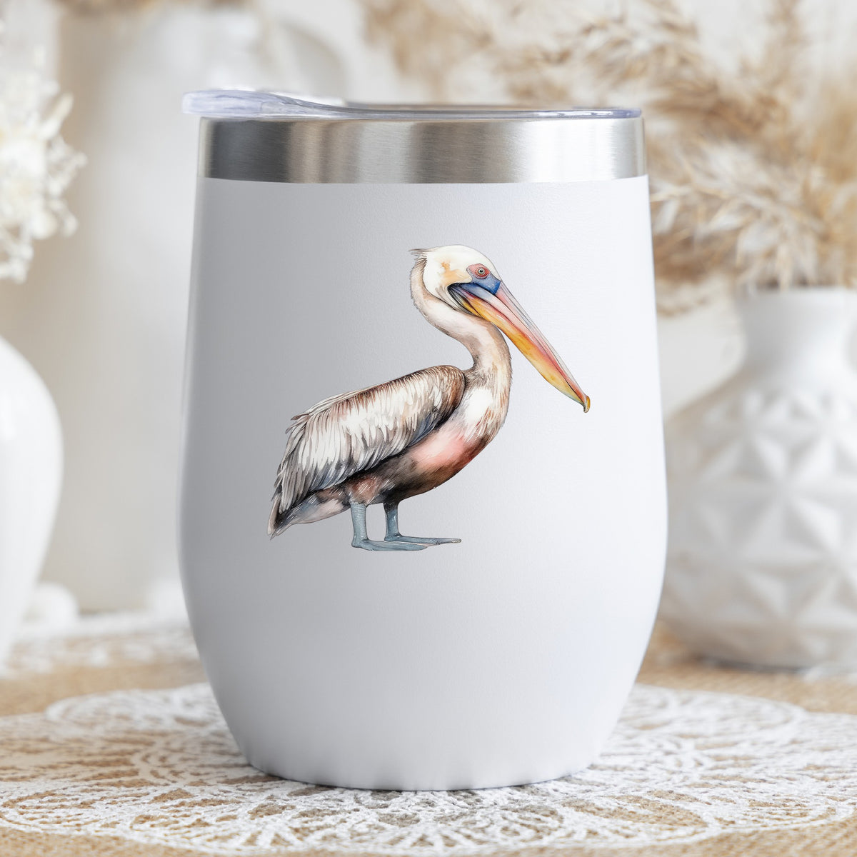 Walking Pelican UV DTF sticker applied to a stemless wine glass