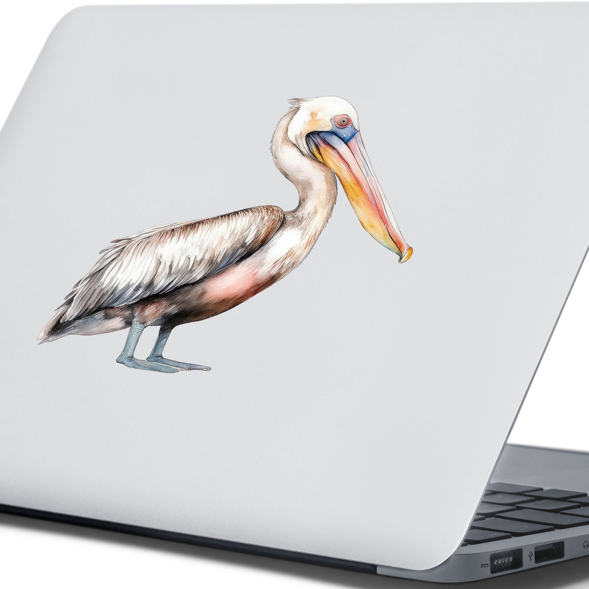 Walking Pelican UV DTF sticker applied to a laptop