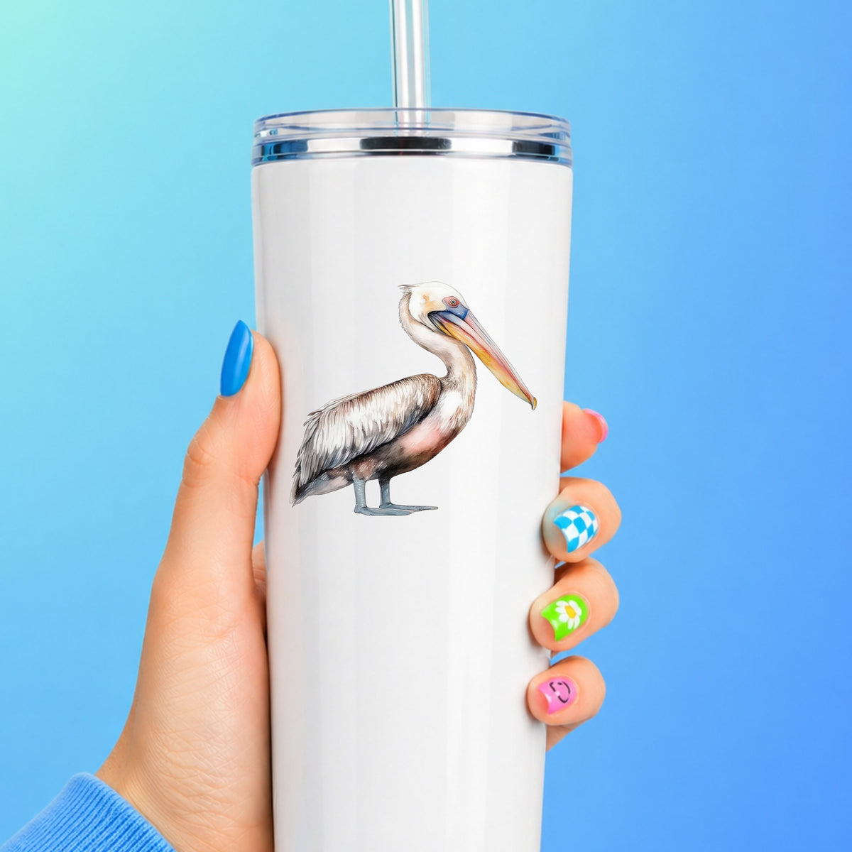 Walking Pelican UV DTF sticker applied to a white tumbler