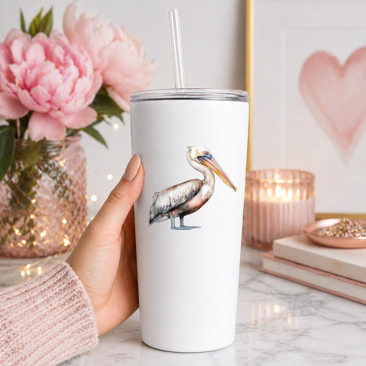 Walking Pelican UV DTF sticker applied to a white tumbler