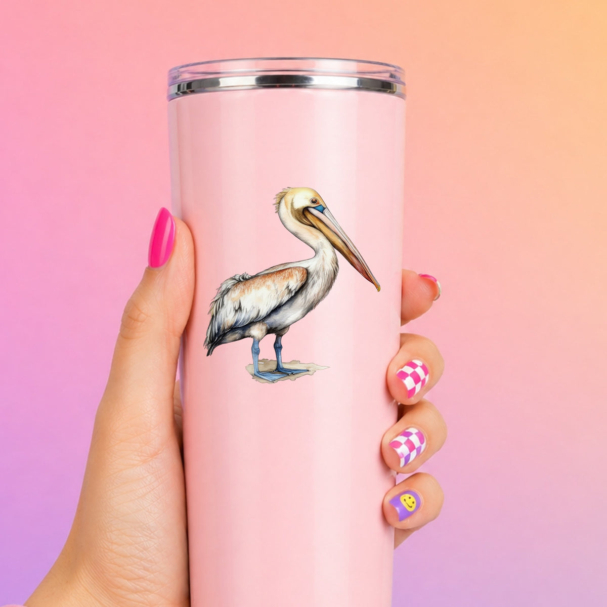 Rust Wing Pelican UV DTF sticker applied to a pink tumbler