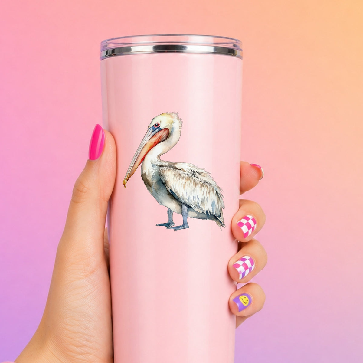 Cream And Orange Pelican UV DTF sticker applied to a pink tumbler