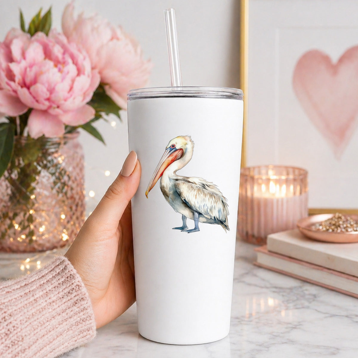 Cream And Orange Pelican UV DTF sticker applied to a white tumbler