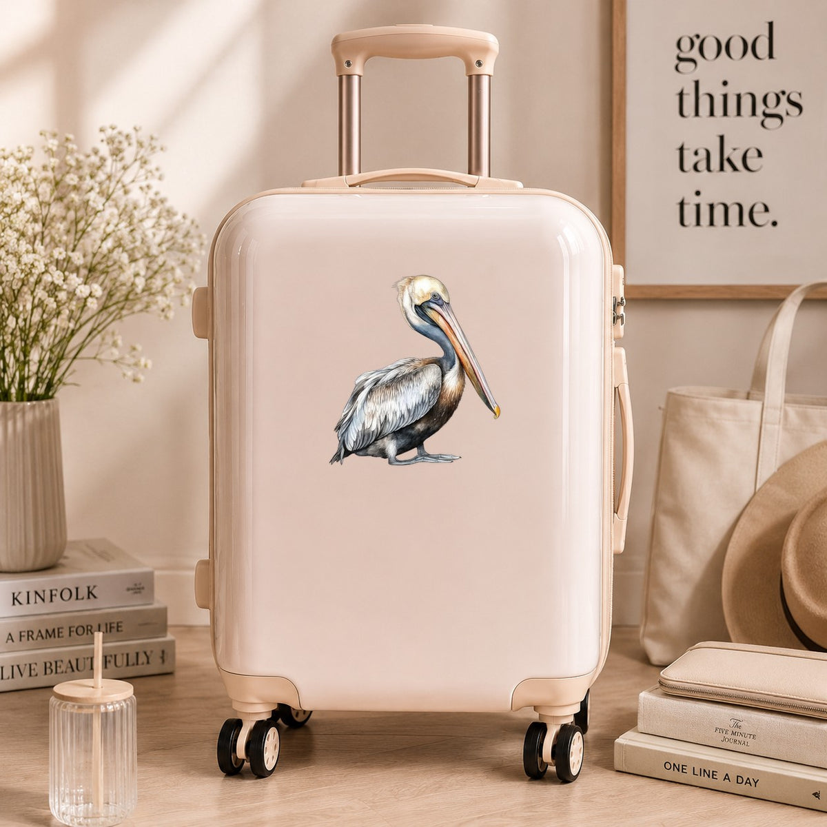 Gray Standing Pelican UV DTF sticker applied to a neutral suitcase