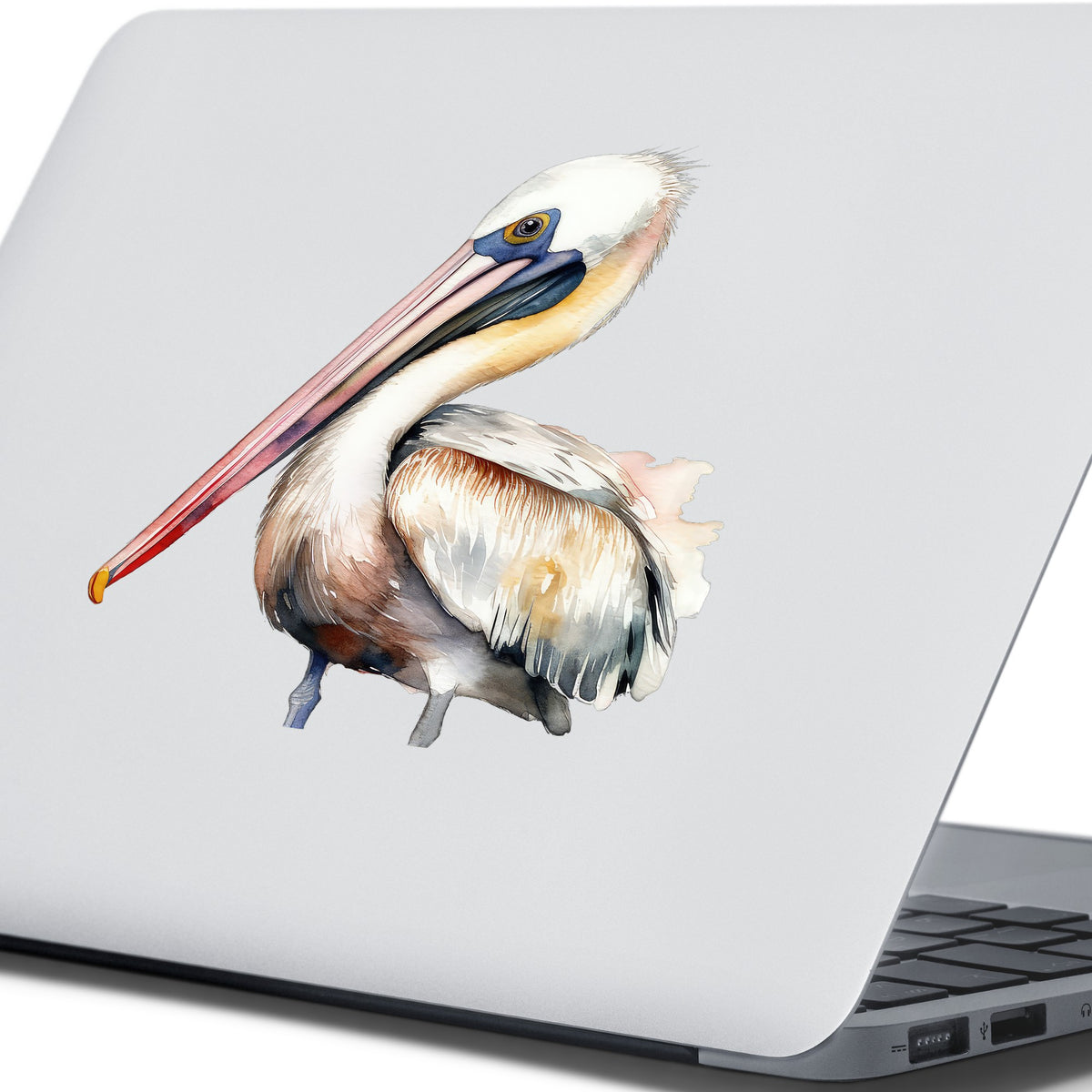 Pink Beak Pelican UV DTF sticker applied to a laptop