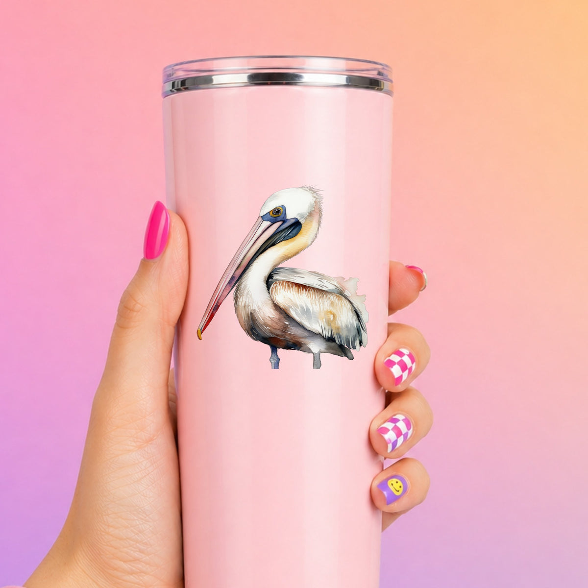 Pink Beak Pelican UV DTF sticker applied to a pink tumbler