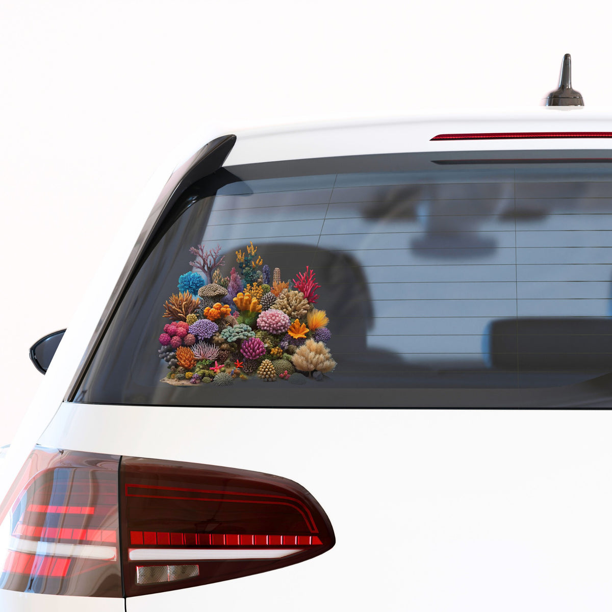 Colorful Coral Reef UV DTF sticker applied to the rear window of a white car